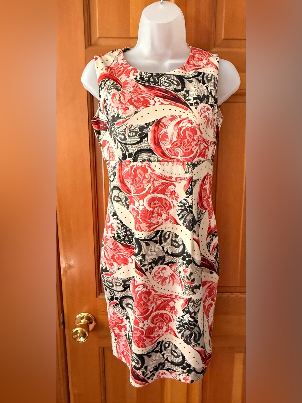 Sleeveless Floral Swirl Mini Dress in Coral and Black